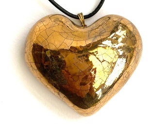 Large gold heart pendant with an adjustable cotton cord. Special gift for a loved one.