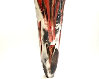 Tall red smoke fired ceramic pot on a stand. Unique and thoughtful gift or great enhancement for a classy interior.
