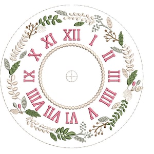 May include: A white clock face with Roman numerals and a pearl-like border. The clock face is surrounded by a wreath of green leaves, white flowers, and brown branches.