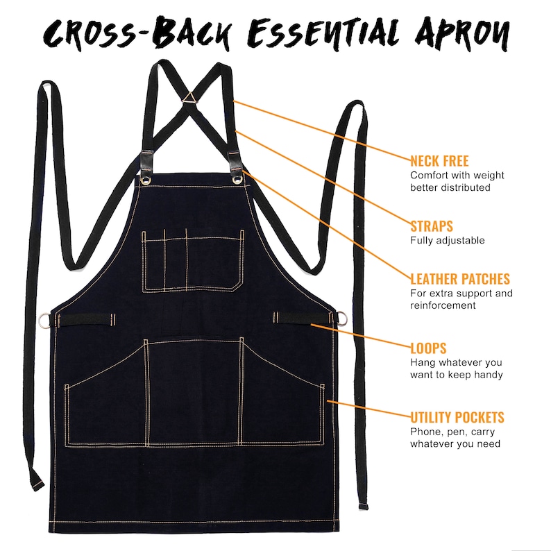 May include: Black denim apron with adjustable straps, leather patches, and multiple pockets. The apron has a cross-back design and is labeled "CROSS-BACK ESSENTIAL APRON".