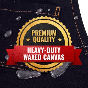 May include: A gold and red label with the text "Premium Quality" and "Heavy-Duty Waxed Canvas" on a dark blue fabric background.