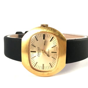 Vintage Women SWISS watch &quot; EXACTUS &quot; incablock 17J from 70s . Rare Swiss timepiece. Comes with new leather band.
