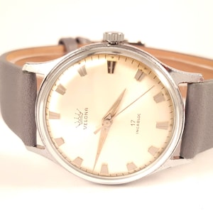 Vintage SWISS men watch Velona from 60s . Rare Swiss timepiece. Comes with new leather band. Men wristwatch. Swiss watch. Gift for him