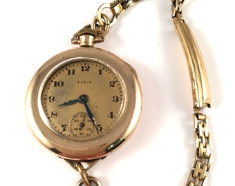 Antique elgin shop ladies pendant watch