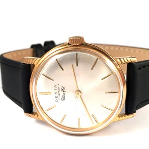 RARE Vintage men wristwatch called &quot;DESTA Ultra flat &quot; . Made in Swiss, comes with brand new leather band!