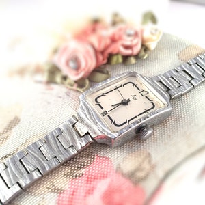 Vintage Ladies watch called &quot;Luch&quot; ( eng.&quot;Ray&quot;), made in USSR, RARE date location on the dial, silver tone watch,great gift idea ..