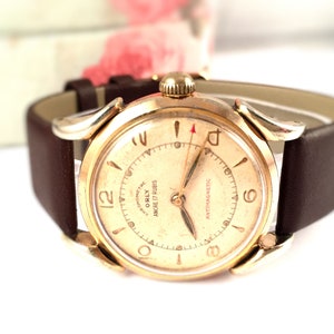 Vintage SWISS men watch clled "ORLY " from 60s . Rare Swiss timepiece. Gold plated case, comes with new leather band. Swiss watch. Men watch