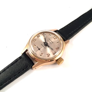 RARE Vintage Swiss lady watch called RUTINA. Made in Swiss, petite women watch, classic dial and round case, leather strap.