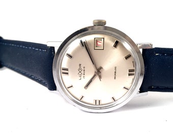 RARE montre vintage fabriquée en Suisse appelée « LUXOR », livrée avec un tout nouveau bracelet en cuir ! Montre suisse. Montre vintage homme. millésime