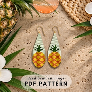 May include: A pair of teardrop-shaped seed bead earrings featuring a pineapple design with a yellow and orange fruit body and a green leafy top, suspended from gold-toned metal hooks. The text "Seed bead earrings PDF PATTERN" is visible.