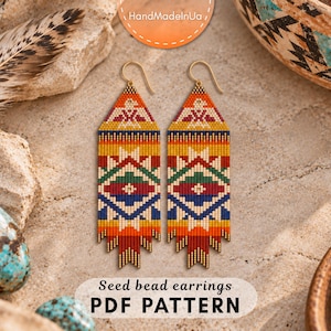May include: A pair of long, dangling seed bead earrings featuring a geometric pattern in orange, yellow, red, green, blue, and white. The earrings have gold-toned hooks and a multi-pointed fringe at the bottom. The text reads Seed bead earrings PDF PATTERN.