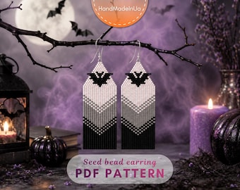 May include: A pair of long, rectangular seed bead earrings featuring a gradient pattern that transitions from white at the top to gray in the middle and black at the bottom. Each earring displays a black bat silhouette near the top hook.