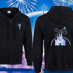 May include: Black zip-up hoodie with a blue and purple watercolour design of Cinderella's castle on the back and a blue fairy on the front.