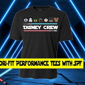 May include: Black t-shirt with a graphic of Disney characters and lightsabers. The text "DISNEY CREW" is displayed above a pink and white lightsaber design. The shirt also features the text "DRI-FIT PERFORMANCE TEES WITH SPF" in a yellow banner.