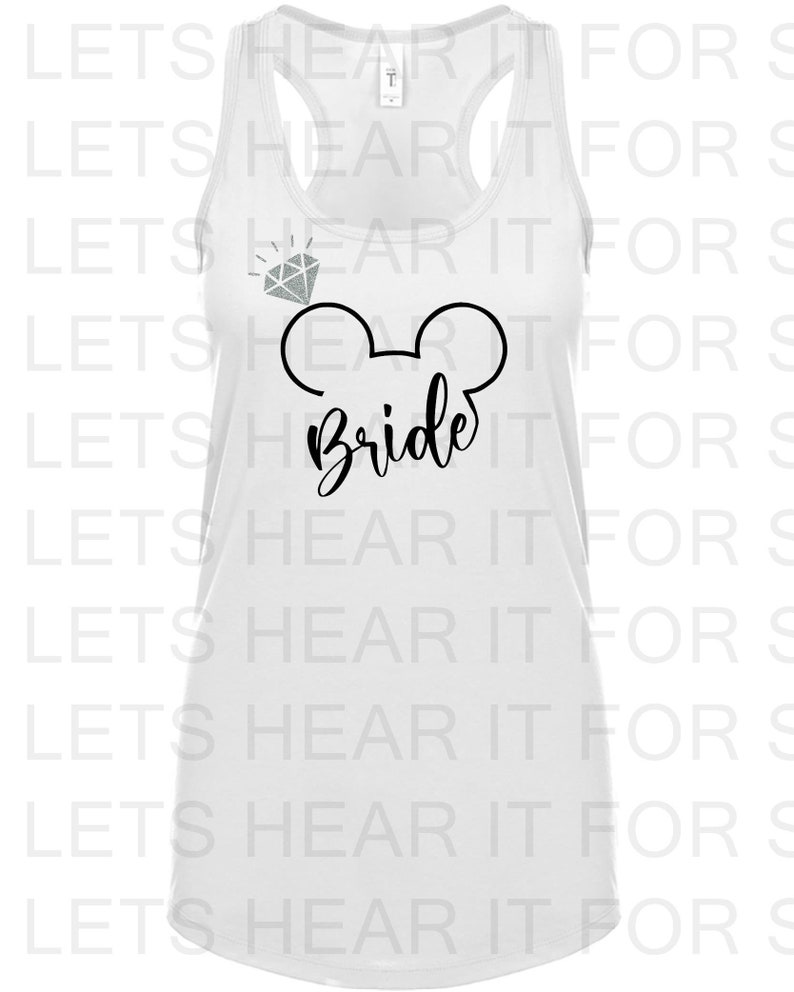 May include: White tank top with a black Mickey Mouse head and the word "Bride" written underneath. A diamond is above the Mickey Mouse head.