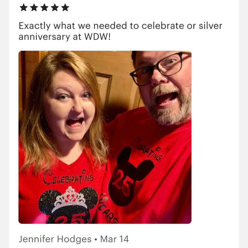May include: A couple wearing red shirts with a black Mickey Mouse design and the text "Celebrating 25 Years".