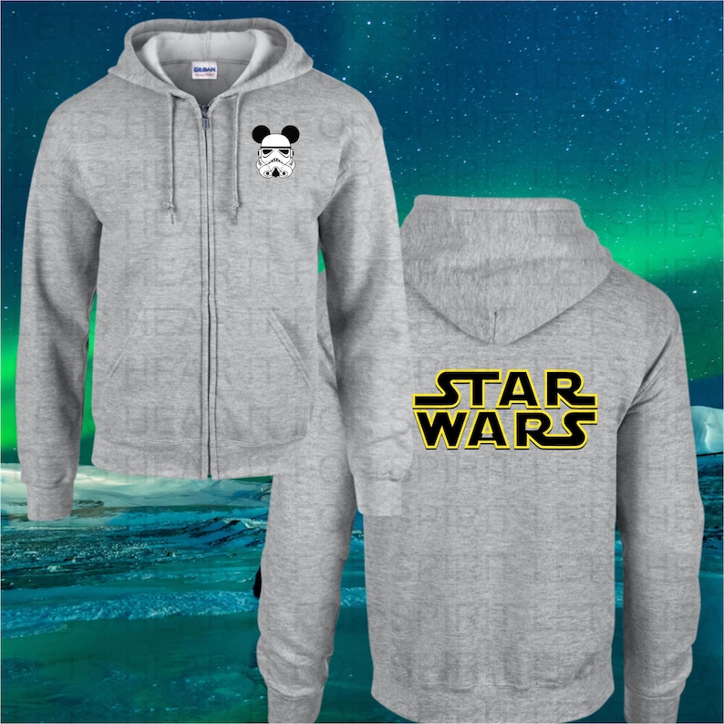 May include: A gray zip-up hoodie with a black and white image of a Stormtrooper with Mickey Mouse ears on the front and the text "STAR WARS" in yellow on the back.