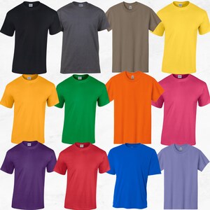 May include: A collection of twelve short-sleeved crew neck t-shirts arranged in a grid. The shirts are displayed in solid colors including black, dark gray, brown, yellow, gold, green, orange, pink, purple, red, blue, and light purple.