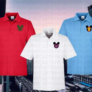 May include: Three polo shirts with different colored Mickey Mouse character designs. The shirts are red, white, and light blue.