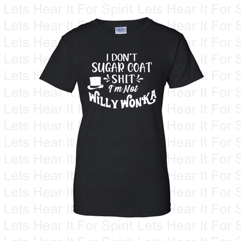 May include: Black t-shirt with the text "I don't sugar coat shit I'm not Willy Wonka" in white. The design includes a top hat graphic. A casual, short-sleeved tee.