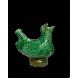 Pájaro de cerámica de arte popular