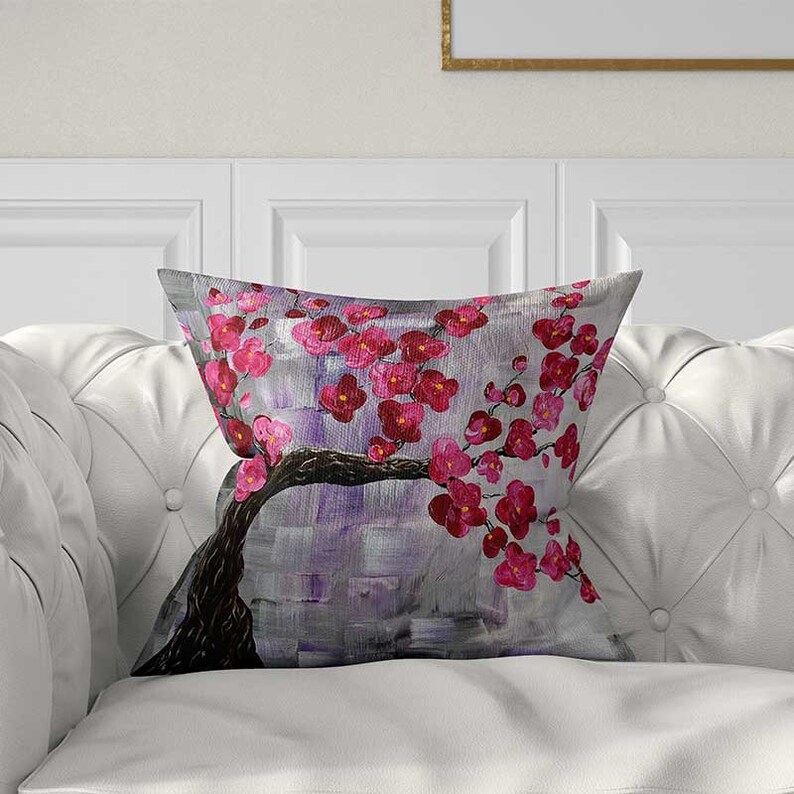 cherry tree art pillow cover with blooming flowers in purple, pink and red