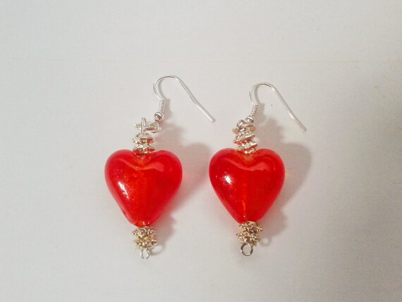 Items similar to Orange Glass Heart Earrings on Etsy