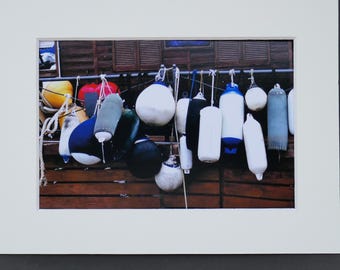 Photography of Colorful Buoys at Marina
