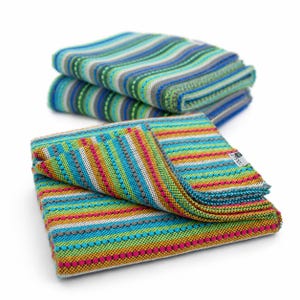 May include: A stack of colorful, striped blankets. The blankets feature a vibrant mix of colors, including blue, green, orange, and pink. The blankets are folded neatly, showcasing the intricate woven pattern and texture.