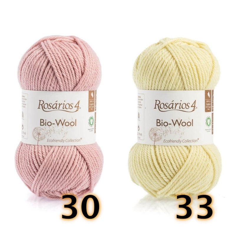 May include: Two skeins of Ros&aacute;rios 4 Bio-Wool yarn, one in soft pink and one in pale yellow. Each skein features a white paper label with the text Ros&aacute;rios 4 Bio-Wool Ecofriendly Collection. The numbers 30 and 33 are printed below each skein.