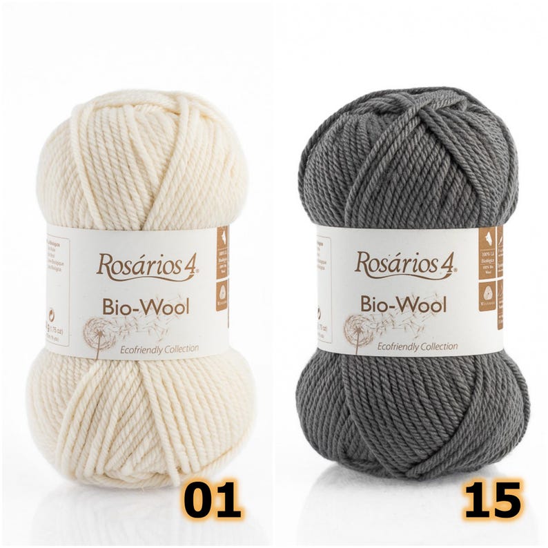 May include: Two skeins of Ros&aacute;rios 4 Bio-Wool yarn, one in off-white and one in dark gray. Each skein features a white paper label with the text Ros&aacute;rios 4 Bio-Wool Ecofriendly Collection and a dandelion graphic. The numbers 01 and 15 are visible.