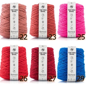 May include: Six spools of yarn in various colors, including pink, red, blue, and brown. Each spool is labeled "Tufting Wool" and "Ros&aacute;rios 4."