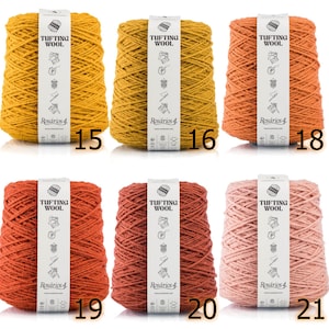 May include: Six spools of yarn in various shades of yellow, orange, and pink. Each spool is labeled "Tufting Wool" and "Ros&aacute;rios 4."