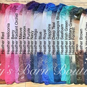 May include: A collection of 20 different colored shirts with a bleached ombre effect. The shirts are arranged in a row from left to right, with the lightest color on the left and the darkest color on the right. The shirts are all made of a soft, comfortable material and are perfect for everyday wear.