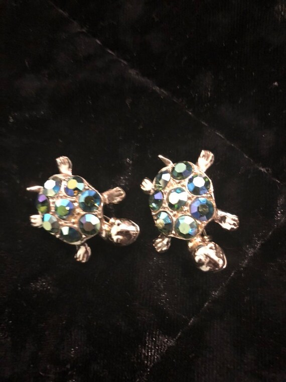 Adorable pair of AB turtle brooches