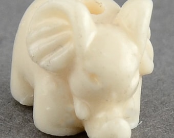Cornsilk Elephant Bead: Synthetic Coral Miniature (10mm x 15mm)