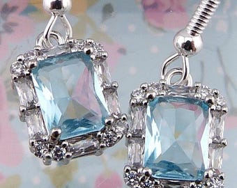 Sparkling Aquamarine Earrings, Single Rectangular Blue Glass Stone Surrounded by Clear Stones - Fancy!