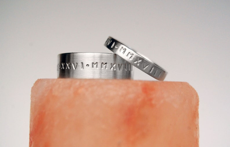 roman numeral eternity rings in silver