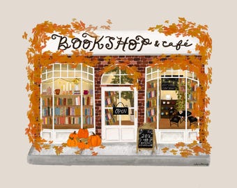 Puede incluir: Un edificio de ladrillo con una fachada blanca y un letrero que dice "BOOKSHOP & cafe". Las ventanas están decoradas con hojas de otoño y calabazas. El letrero frente a la tienda dice "20% de descuento en todos los misterios y thrillers".