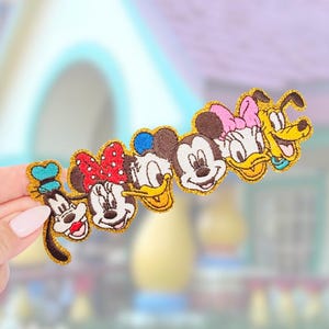 May include: A set of three ceramic mugs with a speckled, matte finish. The mugs are in shades of cream, light gray, and dark gray. Each mug has a simple, minimalist design, perfect for coffee or tea.