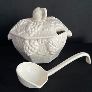 USA pottery soup tureen , with  ladle, white ,raised fruit design, Vintage