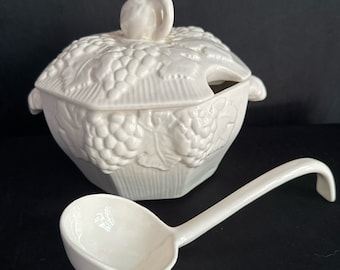 Vintage soup tureen ,with ladle, white ,raised fruit design,USA pottery