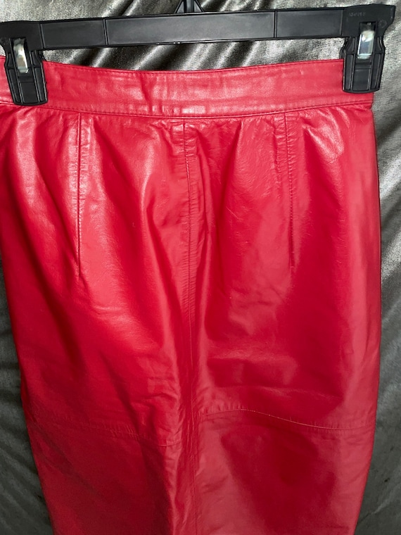 Vtg Red  Leather midi skirt , 24’waist , designer 