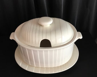 Soup tureen , oval white ,ceramic lidded with under dish ribbed ,handle,by Hillary ,Japan