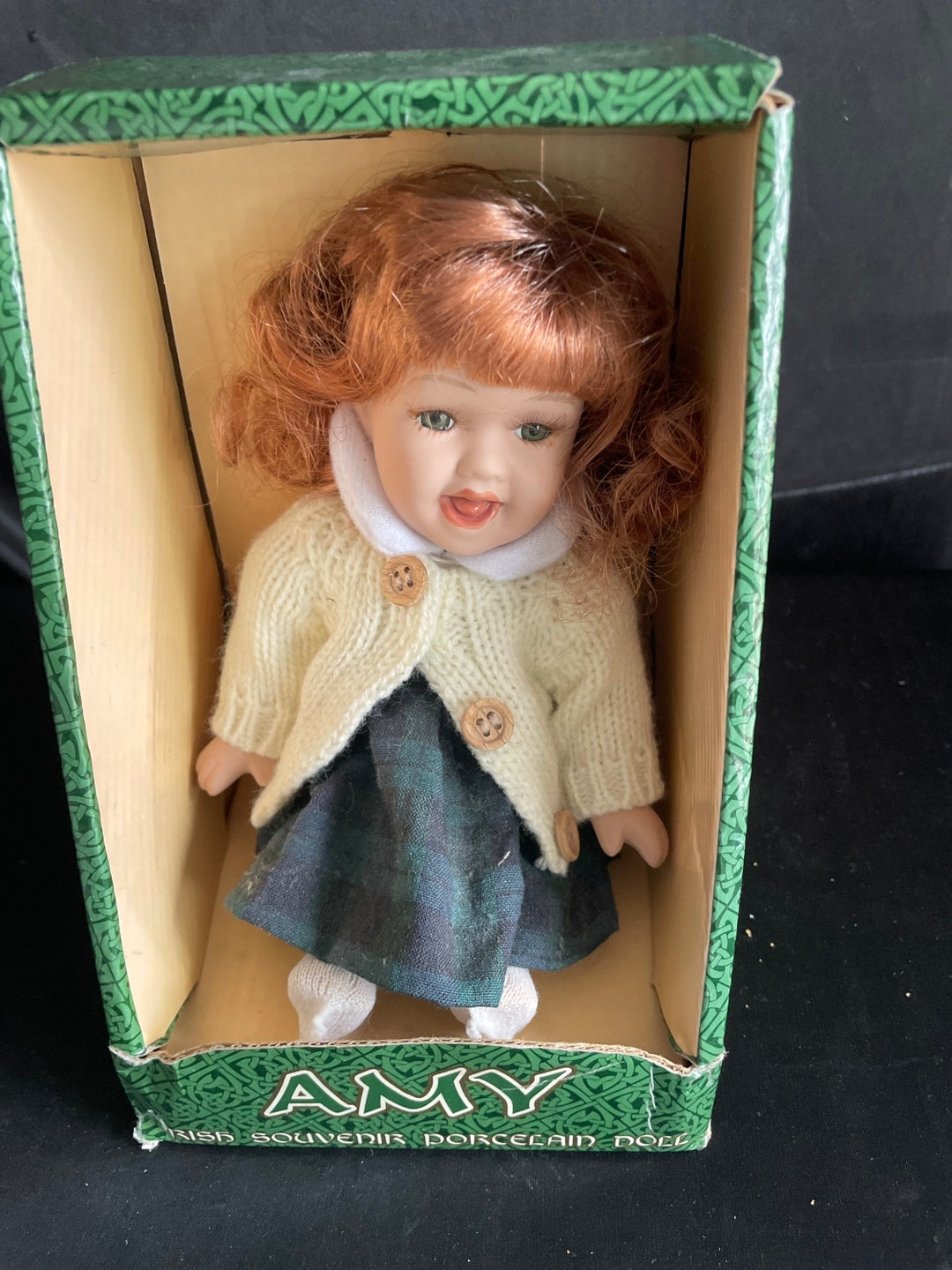 Buy St Patrick Day Doll Imported porcelain Doll Amy souvenir Sitting Doll Irish Wool Sweater plaid Skirt Collectible NIB Online in India