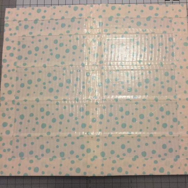 White/turquoise polka dots server duct tape book