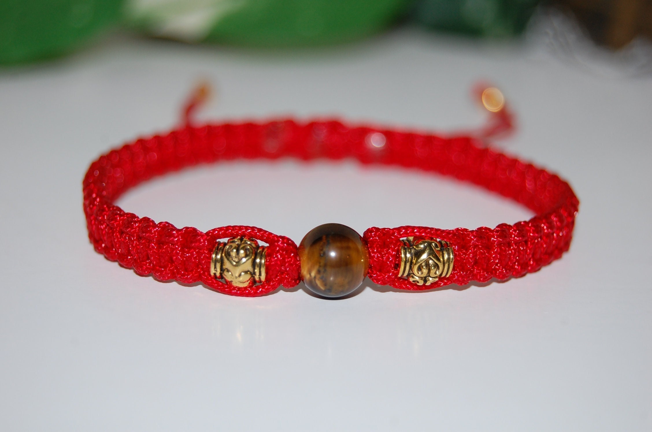 Red bracelet for outlet protection mexico