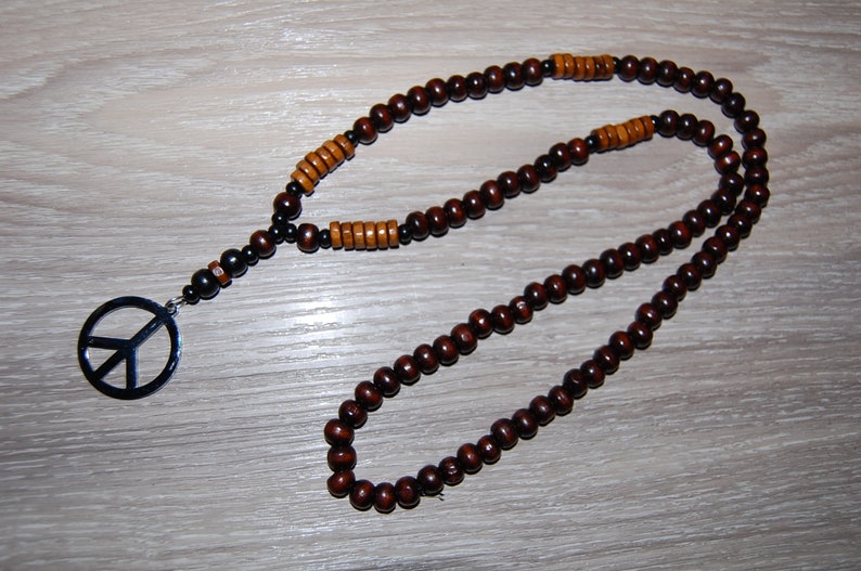 60s , 70s Hippie Clothes for Men Peace NecklaceWood NecklaceMens NecklaceWarrior NecklaceWood 8mm BeadsPrayerProtectionManSurferRetro NecklaceGift for Him $29.99 AT vintagedancer.com