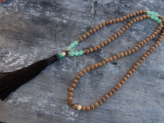 Yoga necklace on sale with tassel