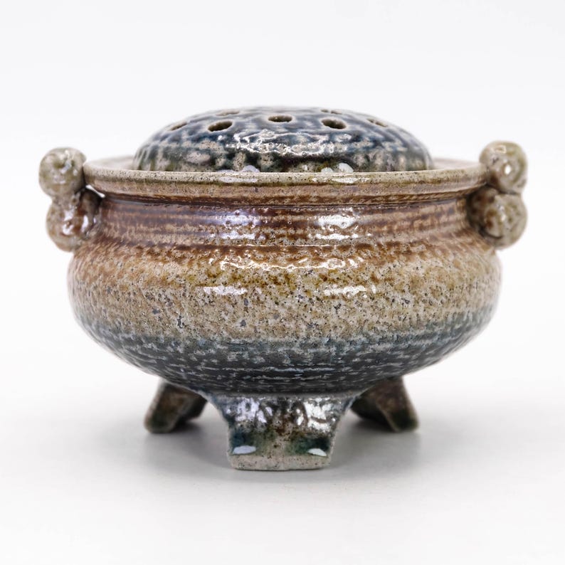 Back view of Mashiko pottery incense burner showing natural glaze variation and handmade wabi sabi character